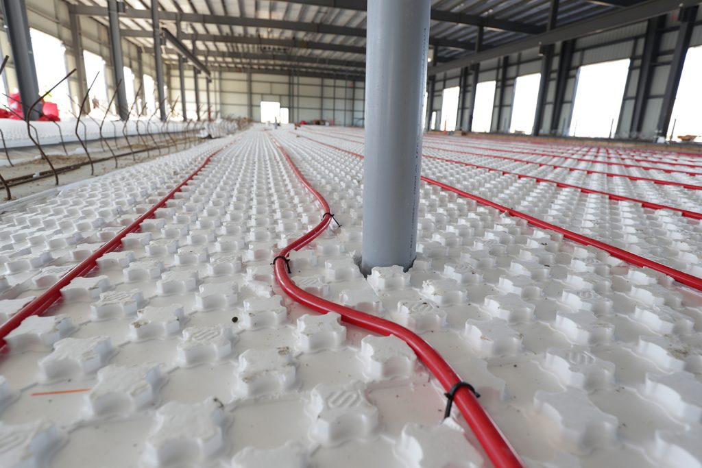 Hydronic Floor Heating Circulates Hot Water Through Tubes