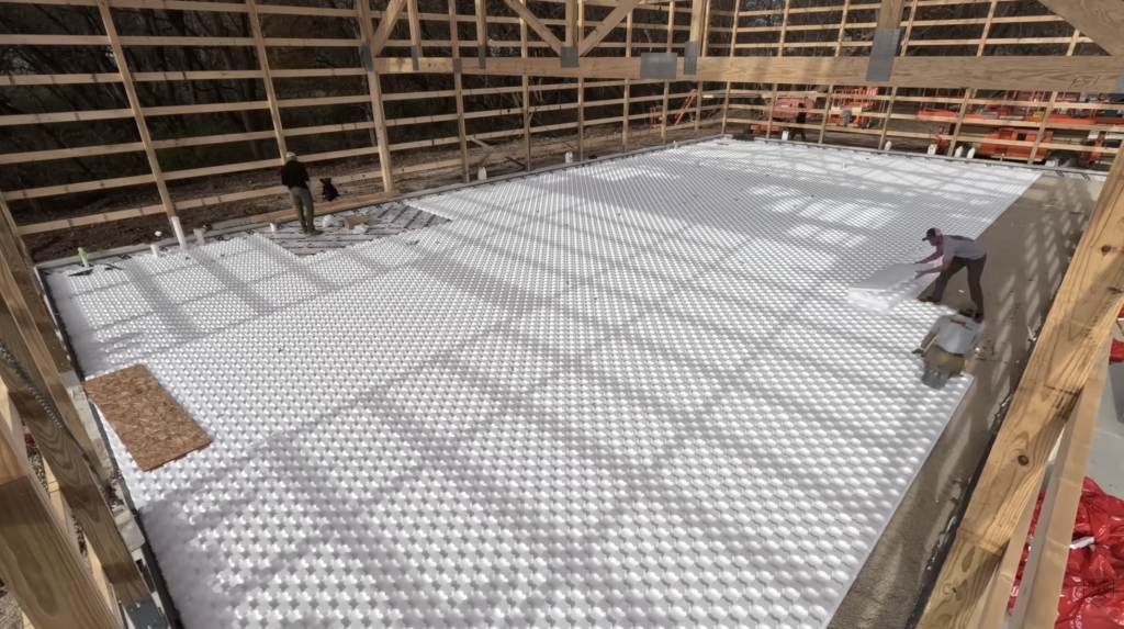 Heat-Sheet® panels nearly complete — flat, locked, and radiant-ready.